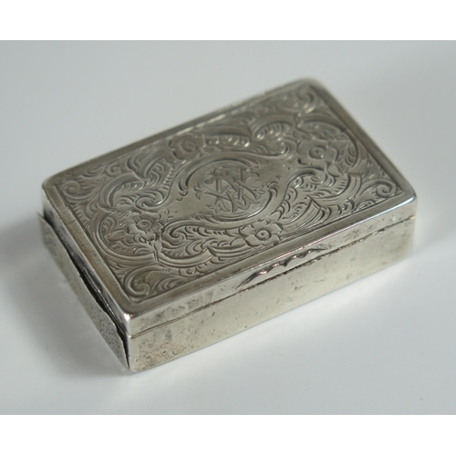 125 - A Silver Snuff with chased foliate scroll decoration, 18.6g. Unable to open