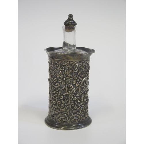 13 - An Edward VII Pierced Silver Mounted Glass Scent Bottle with foliate scroll decoration, Chester 1901... 