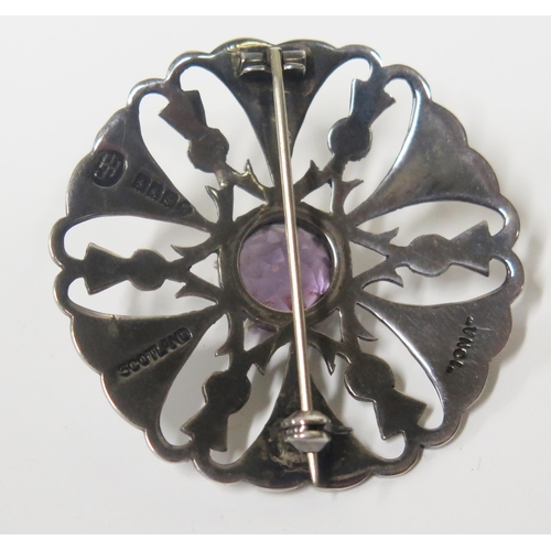 155 - A Scottish IONA Silver and Amethyst Brooch with Celtic and thistle motifs, 40mm diam., Glasgow 1959?... 