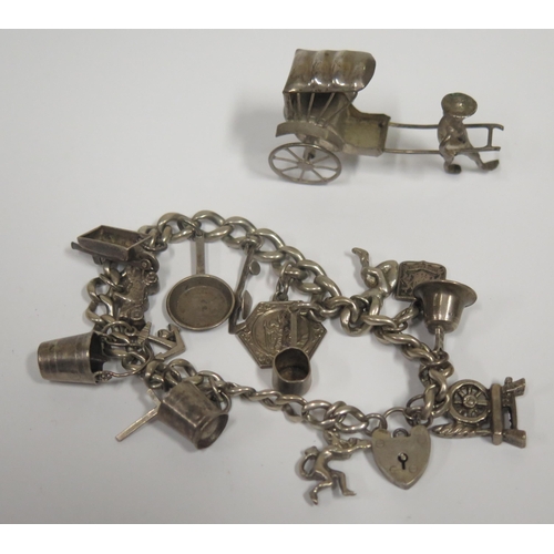 156 - A Silver Charm Bracelet (50g) and Chinese .90 silver rickshaw ornament