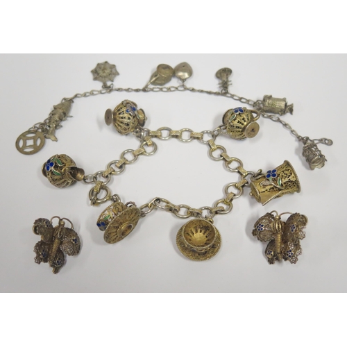 169 - A Silver Gilt Filigree and Enamel Charm Bracelet, pair of butterfly screw back earrings and one othe... 