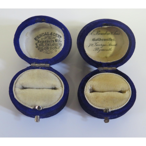 226 - Two Antique Blue Plush and silk lined ring boxes: Kendall & Dent and Bowden & Sons