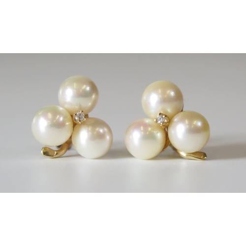 283 - A Pair of 9ct Gold Pearl and Diamond 'Clover' Earrings, 14mm diam., 3.7g