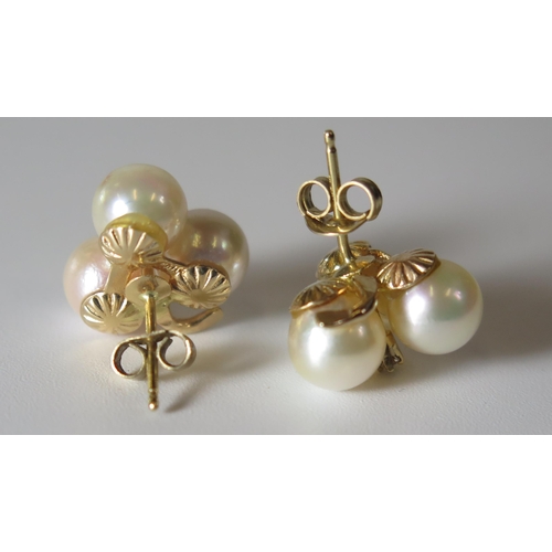 283 - A Pair of 9ct Gold Pearl and Diamond 'Clover' Earrings, 14mm diam., 3.7g