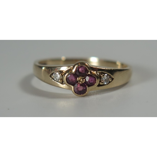 291 - A 9ct Gold, Ruby and Diamond Ring, size R.5, 2.3g