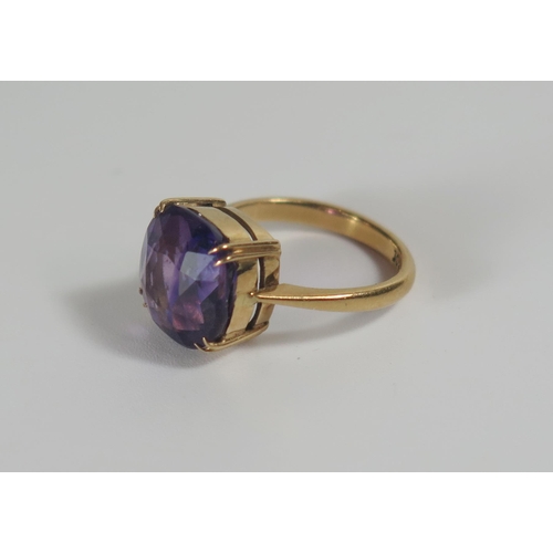 300 - An 18ct Gold and Amethyst Dress Ring, 10.5mm stone, size F, 3.2g