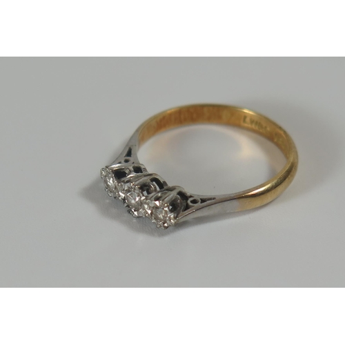 302 - An 18ct Gold and Platinum Three Stone Diamond Illusion Set Ring, 12mm stone setting, size 11, 2.3g