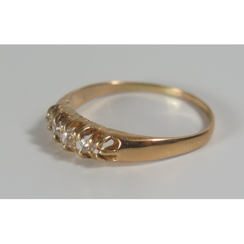 306 - An 18ct Gold and Diamond Five Stone Ring, 13mm setting, size U, 3.1g