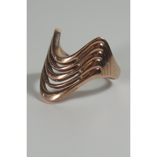 309 - A 9ct Gold 'Wave' Ring, size M, 4.5g