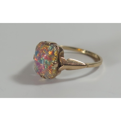 317 - A 9ct Gold and Ammolite Ring, 10.5x8mm stone, size K.5, 1.9g