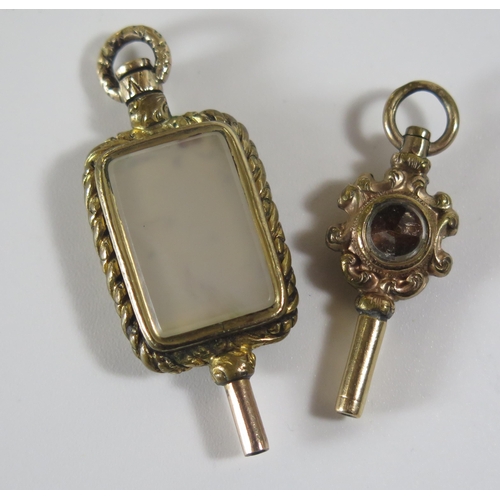 337 - Two Antique Hardstone Mounted Watch Keys, largest 42mm