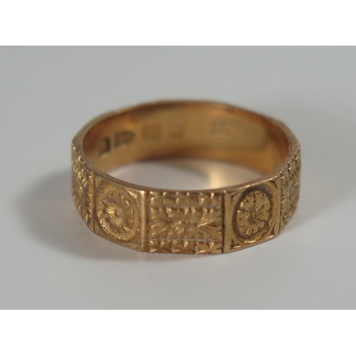 350 - A Victorian 18ct Gold Decahedron Band with chased foliate decoration, 5.5mm diam., Chester 1887, CY ... 