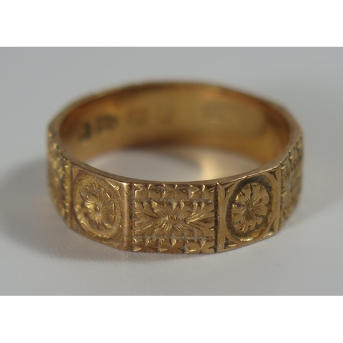 350 - A Victorian 18ct Gold Decahedron Band with chased foliate decoration, 5.5mm diam., Chester 1887, CY ... 