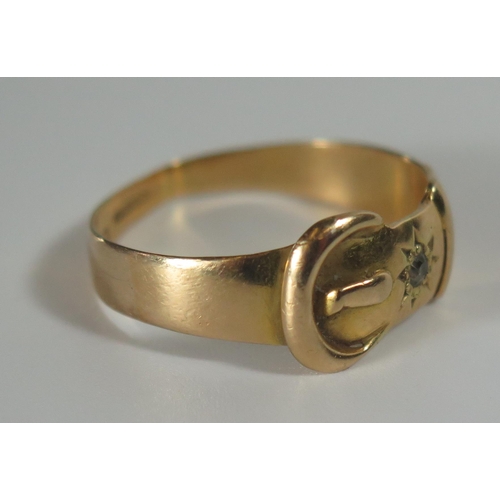 353 - A Victorian 18ct Gold Buckle Ring set with a single diamond, marks rubbed, size U, 4.6g