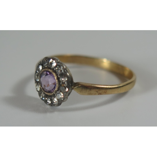 356 - An Antique Amethyst and Diamond Cluster Ring in an unmarked gold setting, 10mm head, size Q, 2.3g