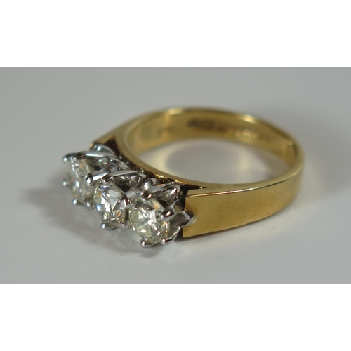 361 - An 18ct Yellow Gold and Diamond Trilogy Ring, size O.5, 7.7g, EDW 1.5ct