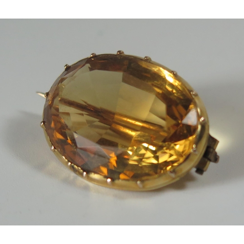 368 - An Antique Citrine Brooch in an unmarked gold setting, 26x19mm, 7g