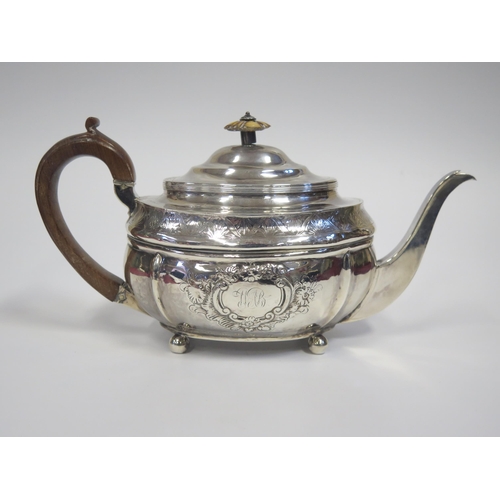 50 - A George III Silver Teapot with embossed and chased decoration, London 1808, CF, 411g **IVORY FINIAL... 