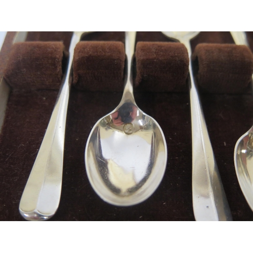 55 - A Cased Set of Elizabeth II Coronation Silver Teaspoons stamped with the Queen's bust to the bowl, S... 