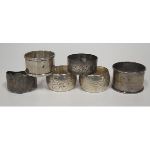 61 - Four English Sterling Silver Napkin Rings (71g) and pair of .830 napkin rings with chased floral dec... 