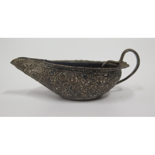 68 - An Indian Silver Plated Sauce Boat with embossed foliate decoration and serpent handle, 14cm long, 1... 