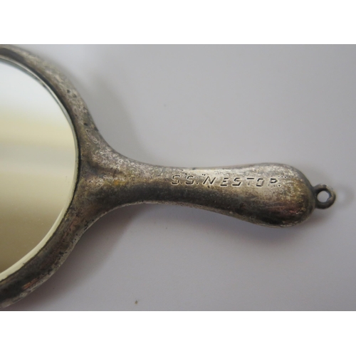 73 - A Birmingham Silver Miniature Hand Mirror, probably 1920, engraved S.S. NESTOR, 9cm