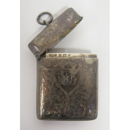 74 - A Victorian Silver Vesta Cased with chased ivy leaf decoration and contemporary monogram, Birmingham... 