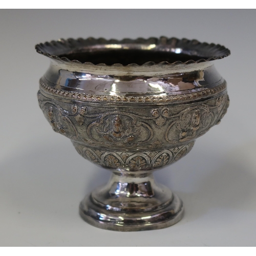 104 - An Indian Silver Stemmed Bowl embossed with Hindu figures, 12 cm diam. x 10.5 cm high, 169.1 g