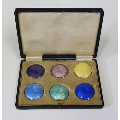 107 - A Cased Set of Six Guilloché Enamel Sample Discs, 34mm diam.