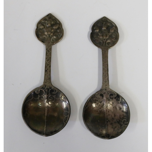 116 - A Pair of 19th Century Mongolian? White Metal Medicine Spoons with embossed and chased decoration, 9... 