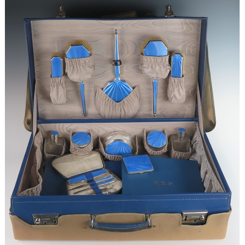 117 - A Superb George V Silver and Blue Guilloché Enamel Travelling Toiletry Set including a six part mirr... 