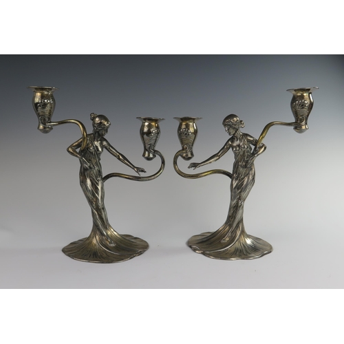 119 - A Pair of WMF Art Nouveau Figural Twin Light Pewter Candelabra modelled as maidens in diaphanous flo... 