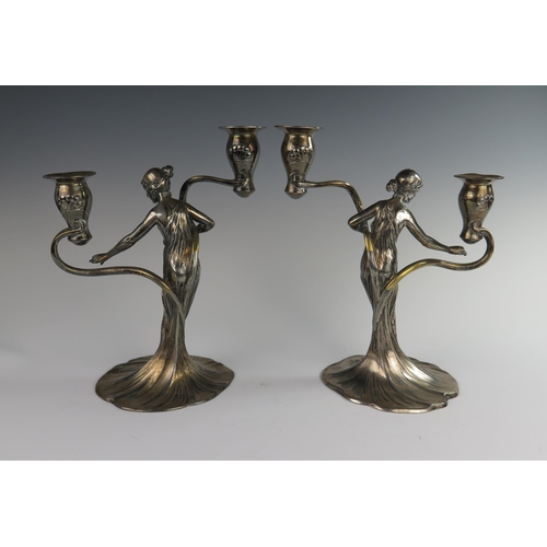 119 - A Pair of WMF Art Nouveau Figural Twin Light Pewter Candelabra modelled as maidens in diaphanous flo... 