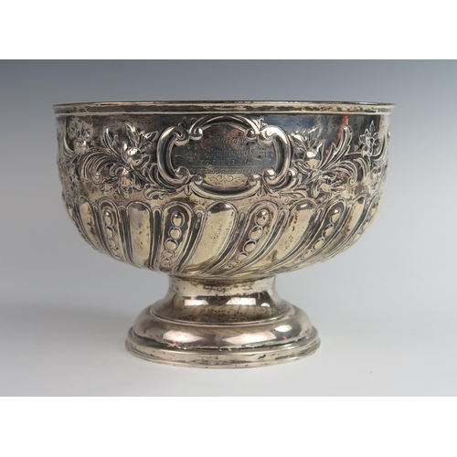 121 - An Edward VII Silver Presentation Punch Bowl with embossed foliate decoration, Birmingham 1909, FB &... 