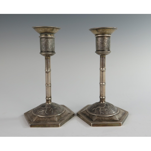 122 - A Pair of Chinese Silver Candlesticks with bamboo decoration, detachable sconces, Wang Hing, 15.5 cm... 