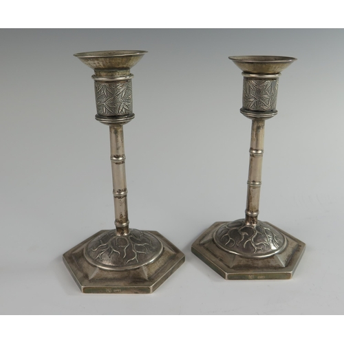 122 - A Pair of Chinese Silver Candlesticks with bamboo decoration, detachable sconces, Wang Hing, 15.5 cm... 