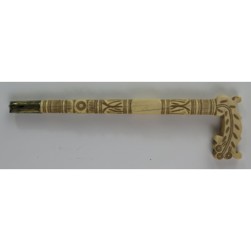 144 - A 19th Century Carved Ivory Parasol Handle, 20 cm