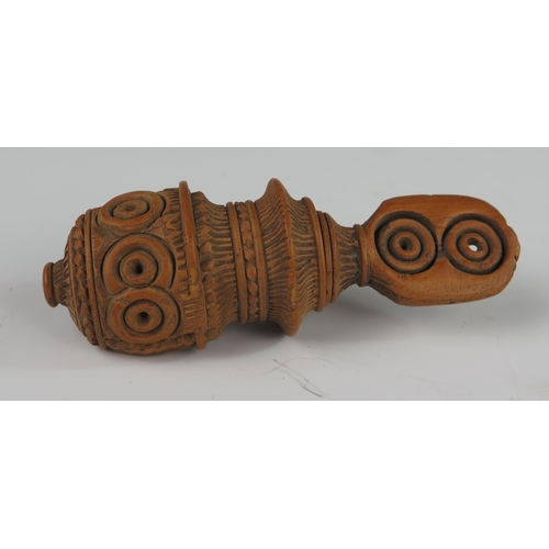 146 - A 19th Century Continental Treen Nutcracker with profuse carved decoration, 10 cm