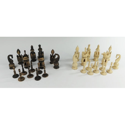 167 - A 19th Century Indian Carved and Stained Bone Chess Set, kings 98 mm, pawns 58 mm