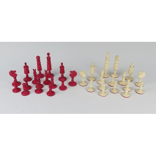 170 - A 19th Century Carved and Stained Bone Chess Set, kings 87 mm, pawns 36 mm