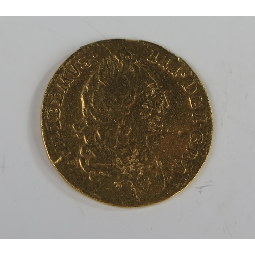 196 - England William III 1695 Gold Half Guinea, 22mm, possibly ex - mount. Good