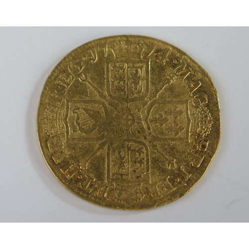 199 - United Kingdom Queen Anne1714 1 Guinea Gold Coin (3rd bust), 25.5mm, Fine, Reference KM# 534 and Sp#... 