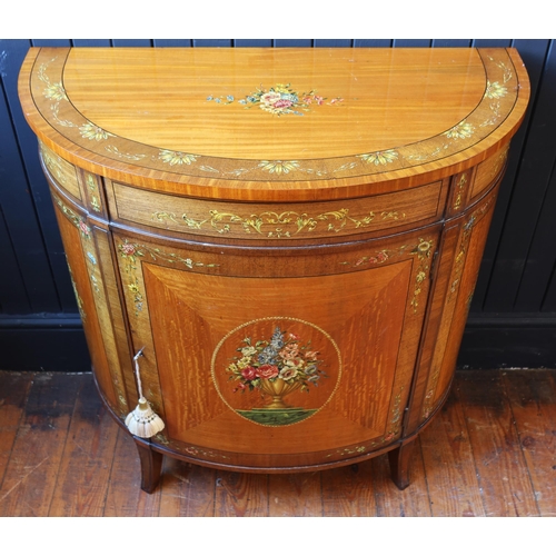 251 - An Edwardian Painted Satinwood Demi Lune Cabinet decorated with flowers, 84(w) x 42(d) x 84(h) cm