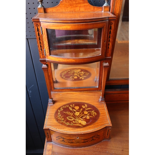 252 - An Edward & Roberts Satinwood and Mahogany Shape Front Dressing Table with foliate marquetry inlay, ... 