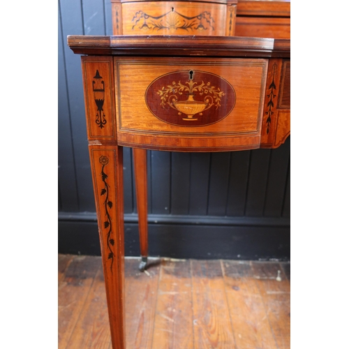 252 - An Edward & Roberts Satinwood and Mahogany Shape Front Dressing Table with foliate marquetry inlay, ... 