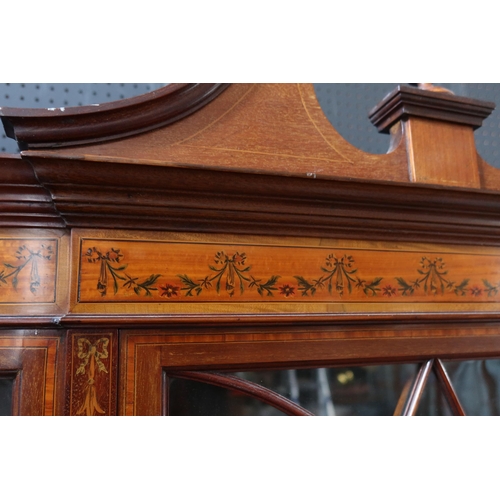 254 - A Mahogany, Satinwood, Crossbanded and Strung Glazed Bow Fronted China Cabinet with marquetry inlay ... 