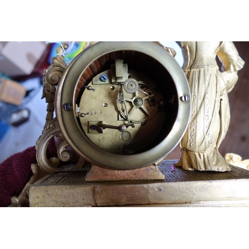 280 - A 19th Century French Gilt Spelter Figural Clock beneath a glass dome, striking movement signed S. M... 