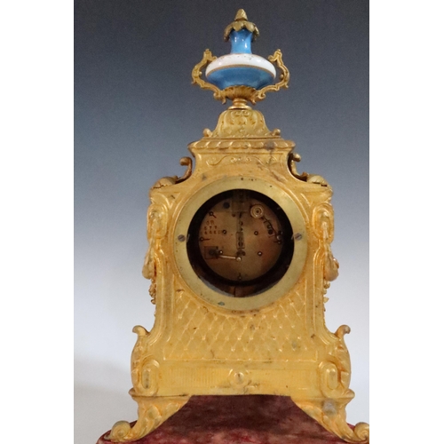 282 - A 19th Century French Gilt Metal Mantle Clock with Sevres Panels and on a gilt wood base, striking m... 