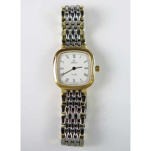 294A - A Ladies OMEGA De Ville Bi-metal Wristwatch, the 21mm case with Roman numerals and quartz movement a... 