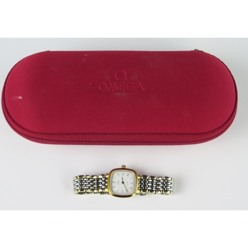 294A - A Ladies OMEGA De Ville Bi-metal Wristwatch, the 21mm case with Roman numerals and quartz movement a... 